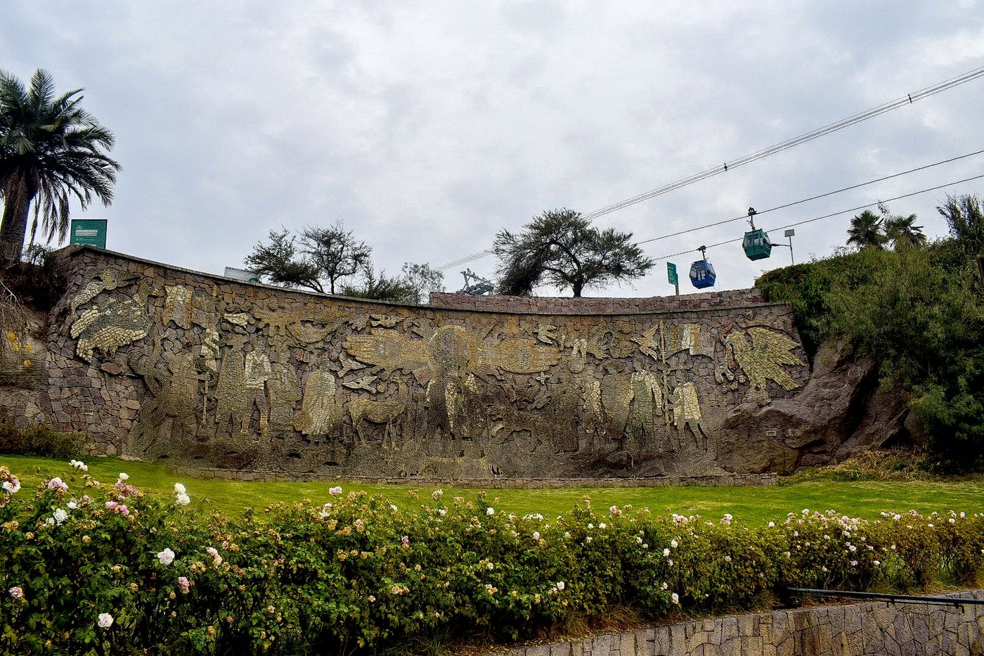 Long mosaic mural running alongside the Piscina Tupahue in the Parque Metropolitano, Santiago
