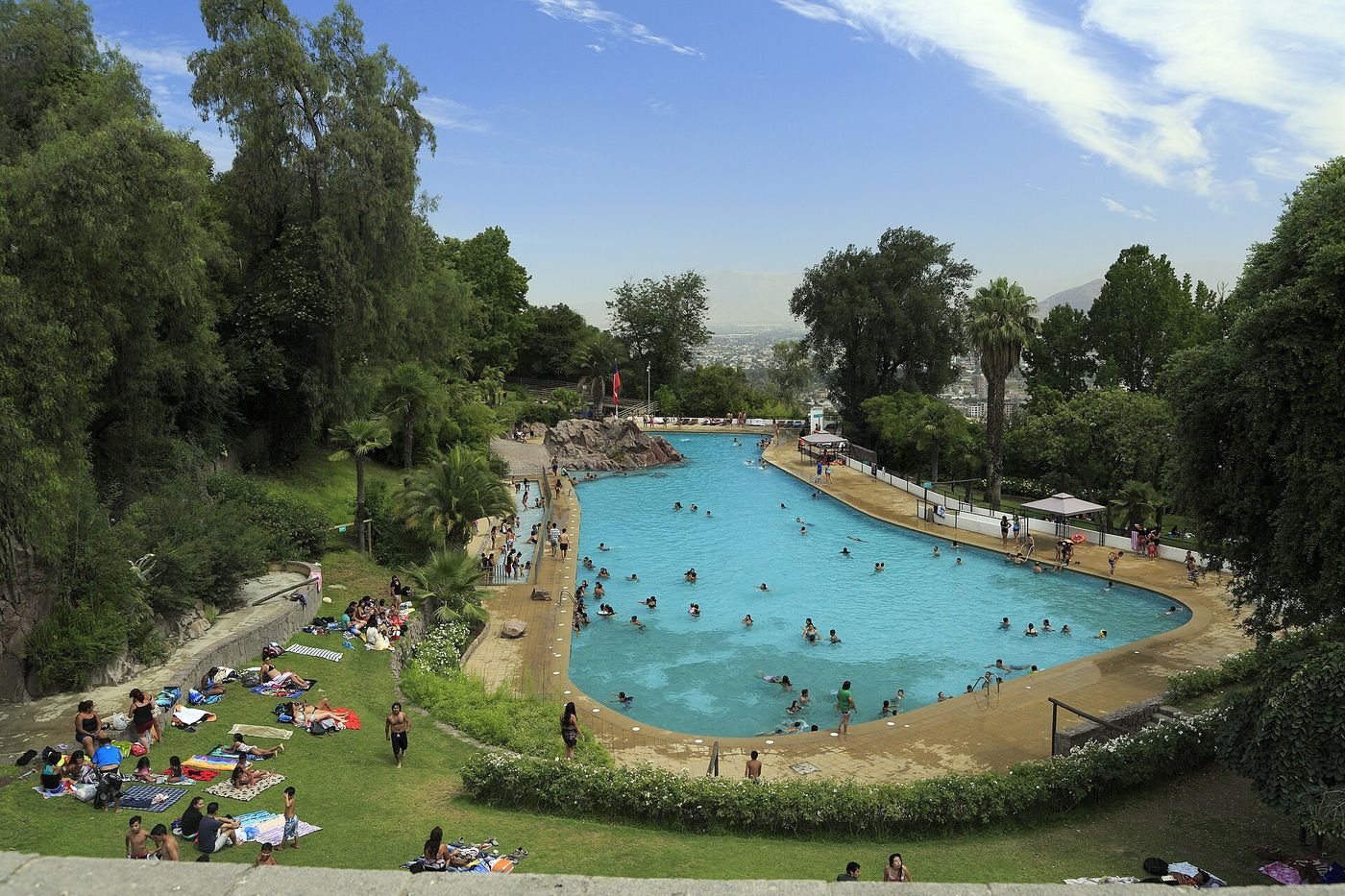 Open-air swimming pool on the wooded slope of Cerro San Cristobal above Santiago